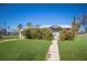 Single story home with a grassy yard and walkway at 11907 45Th W Ave, Cortez, FL 34215
