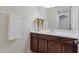 Bathroom with vanity and neutral-toned wood cabinets at 12232 Perennial Pl, Lakewood Ranch, FL 34211