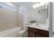 Clean bathroom with tub, toilet, and vanity at 12232 Perennial Pl, Lakewood Ranch, FL 34211