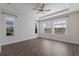 Spacious bedroom with hardwood floors and multiple windows at 12232 Perennial Pl, Lakewood Ranch, FL 34211