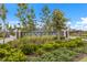 Arbor Grand community entrance with lush landscaping at 12232 Perennial Pl, Lakewood Ranch, FL 34211