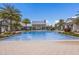 Relaxing community pool with a beautiful clubhouse at 12232 Perennial Pl, Lakewood Ranch, FL 34211