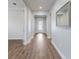 Spacious entryway with hardwood floors and archways leading to other rooms at 12232 Perennial Pl, Lakewood Ranch, FL 34211