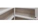 Empty pantry with white shelves offering ample storage at 12232 Perennial Pl, Lakewood Ranch, FL 34211