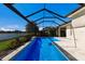 Enclosed pool with lake view at 12232 Perennial Pl, Lakewood Ranch, FL 34211