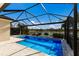 Enclosed pool with lake view at 12232 Perennial Pl, Lakewood Ranch, FL 34211