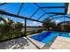 Enclosed pool with lake view at 12232 Perennial Pl, Lakewood Ranch, FL 34211