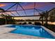 Enjoy sunset views from this screened lanai and refreshing pool at 12232 Perennial Pl, Lakewood Ranch, FL 34211