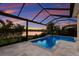 Relaxing pool and screened lanai with gorgeous sunset views at 12232 Perennial Pl, Lakewood Ranch, FL 34211
