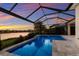 Enjoy breathtaking sunsets by the pool and screened lanai at 12232 Perennial Pl, Lakewood Ranch, FL 34211