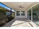 Spacious screened porch with tile flooring at 12232 Perennial Pl, Lakewood Ranch, FL 34211