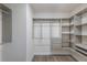 Large walk-in closet with ample shelving and hanging space at 12232 Perennial Pl, Lakewood Ranch, FL 34211
