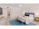 Main bedroom with ensuite bathroom and ample space at 1240 Dolphin Bay Way # 204, Sarasota, FL 34242