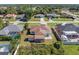 Aerial view highlighting home, pool, and shed at 1243 Inverness St, Port Charlotte, FL 33952