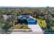 Single-Gathering home with two-car garage and spacious backyard, situated on a tree-lined street at 13618 2Nd Ne Ave, Bradenton, FL 34212