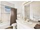 Clean bathroom with a shower/tub combo and updated vanity at 13618 2Nd Ne Ave, Bradenton, FL 34212