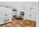Elegant dining area with hardwood floors and a decorative rug at 13618 2Nd Ne Ave, Bradenton, FL 34212