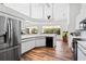 Modern kitchen with stainless steel appliances and white cabinetry at 13618 2Nd Ne Ave, Bradenton, FL 34212
