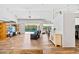 Open living space with pool view and a large entertainment center at 13618 2Nd Ne Ave, Bradenton, FL 34212