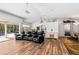 Open living space featuring hardwood floors and ample natural light at 13618 2Nd Ne Ave, Bradenton, FL 34212