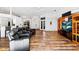 Spacious living area featuring hardwood floors and access to other rooms at 13618 2Nd Ne Ave, Bradenton, FL 34212