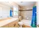 Bathroom featuring a bathtub, shower and vanity with sink at 1496 Palm View Rd, Sarasota, FL 34240