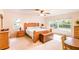Primary bedroom showcasing natural light from two windows and comfortable furnishings at 1496 Palm View Rd, Sarasota, FL 34240