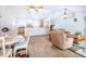 Open living and dining area that offers wood floors and an open kitchen at 1496 Palm View Rd, Sarasota, FL 34240