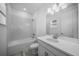 Clean bathroom with bathtub, toilet and vanity at 15033 Shady Palms Ln, Nokomis, FL 34275