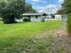 Spacious backyard with grassy lawn at 1680 17Th St, Sarasota, FL 34234