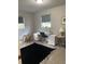 Serene bedroom with a workspace and dark-colored rug at 1680 17Th St, Sarasota, FL 34234