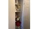Linen closet with shelving and ample storage space at 1680 17Th St, Sarasota, FL 34234