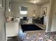 Home office features a workspace with ample light and storage at 1680 17Th St, Sarasota, FL 34234