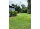Grass lawn in the side yard at 1680 17Th St, Sarasota, FL 34234