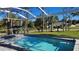 Relaxing pool area with screened enclosure at 1718 Jagust Rd, North Port, FL 34288