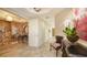 Spacious entryway with a patterned wall and built-in shelving at 2050 Benjamin Franklin Dr # B904, Sarasota, FL 34236