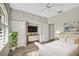 Spacious bedroom with wood-look floors and built-in shelving at 2316 Harrier Way, Nokomis, FL 34275
