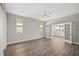 Bright bonus room with hardwood floors and French doors at 2316 Harrier Way, Nokomis, FL 34275