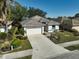 One-story house with garage and landscaping at 2316 Harrier Way, Nokomis, FL 34275