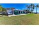 Stunning backyard oasis with a pool and waterfront views at 320 S Shore Dr, Sarasota, FL 34234