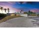 Modern home with clean lines and beautiful sunset views at 320 S Shore Dr, Sarasota, FL 34234