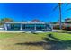 Modern home with a large backyard, stunning pool and direct waterfront access at 320 S Shore Dr, Sarasota, FL 34234