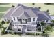 Luxury two-story home with large backyard and attached garage at 32206 Grand National Drive, Myakka City, FL 34251