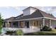 Resort-style backyard oasis with a large pool and spacious patio at 32206 Grand National Drive, Myakka City, FL 34251