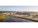 Aerial view of the community equestrian center and pond at 32206 Grand National Drive, Myakka City, FL 34251
