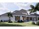 Home exterior with pool and patio furniture at 32206 Grand National Drive, Myakka City, FL 34251