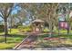 Community gazebo with walkway and holiday decorations at 3426 72Nd E Dr, Sarasota, FL 34243