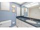 Updated bathroom with vanity and a toilet at 3641 Somerville Dr # 1506, Sarasota, FL 34232