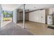 Garage with storage cabinets and water heater at 3641 Somerville Dr # 1506, Sarasota, FL 34232