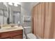 Neat bathroom with a single vanity and tub shower combo at 3671 Parkridge Cir # 8-201, Sarasota, FL 34243